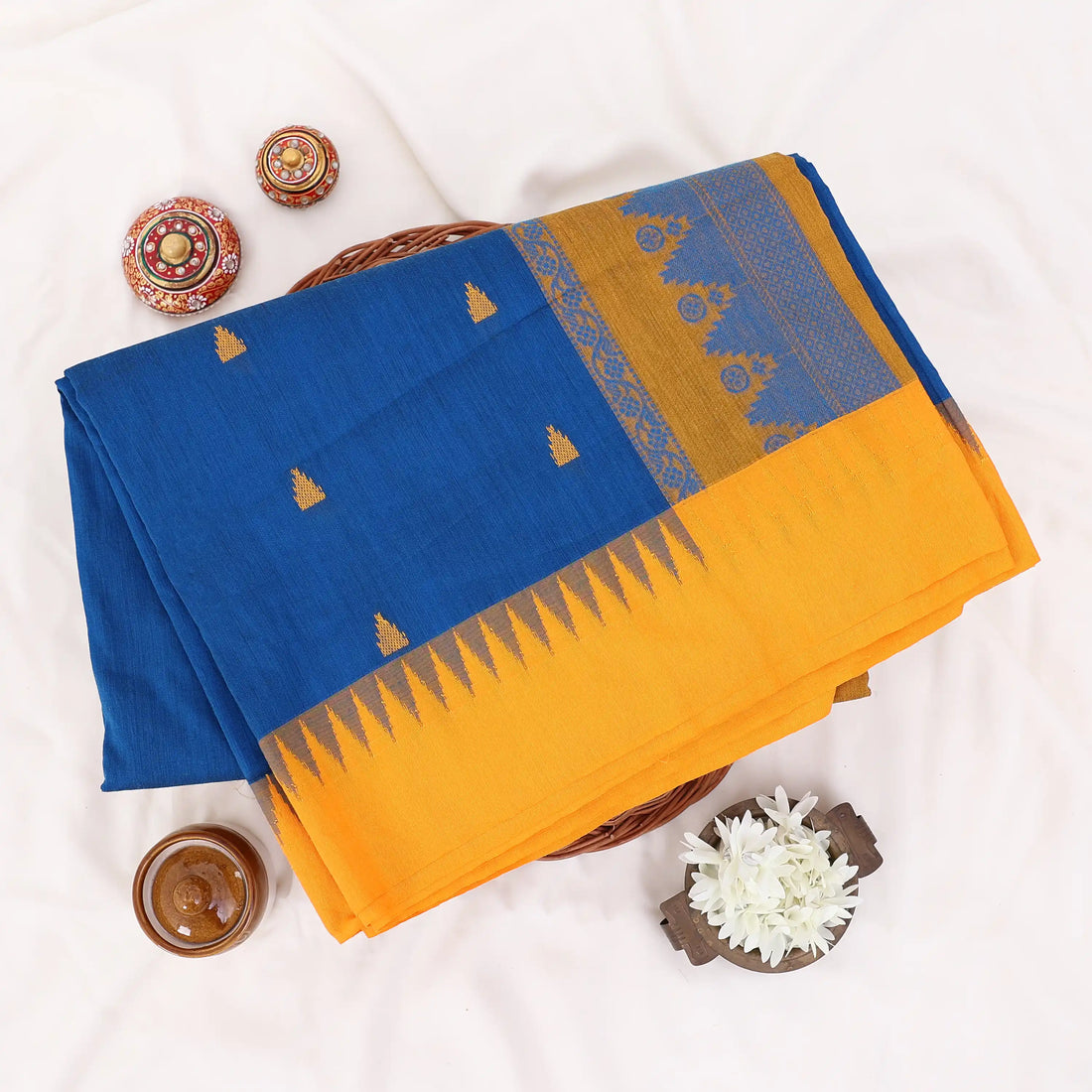 Kalyani Cotton saree with blue body and yellow zari border, front drape view
