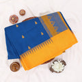 Kalyani Cotton saree with blue body and yellow zari border, Folded Top  view