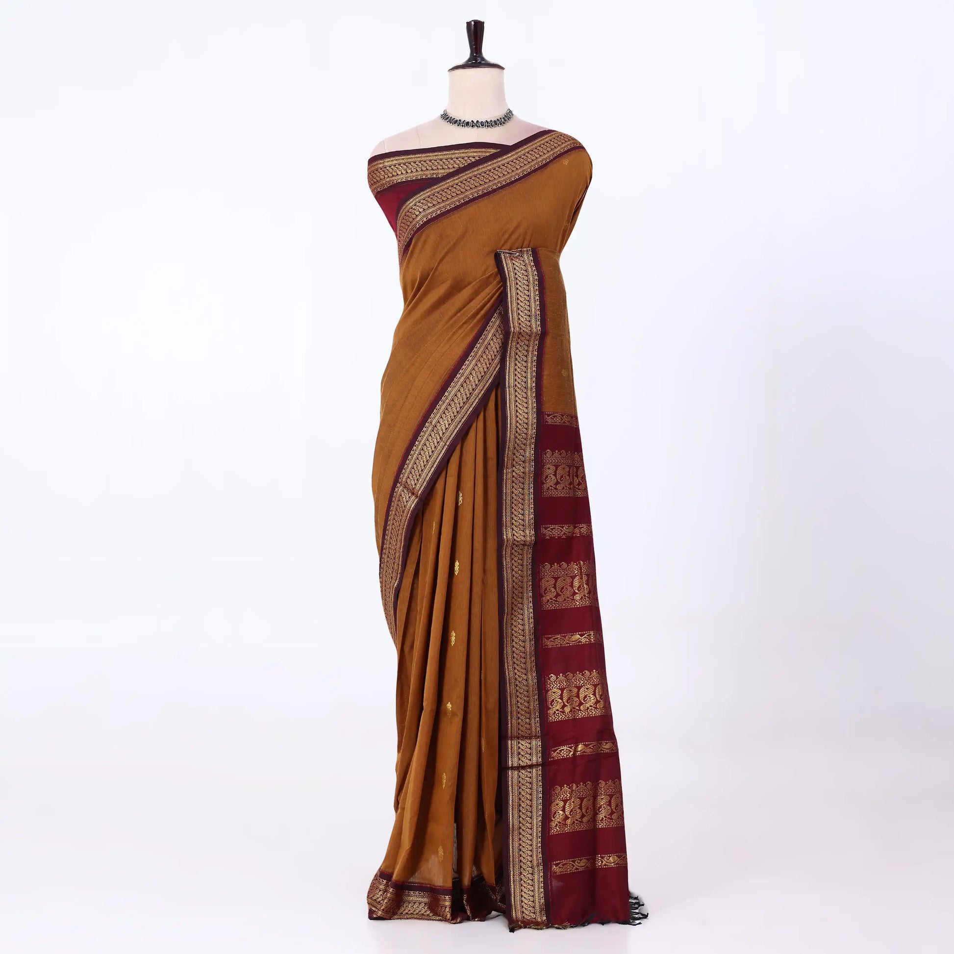 Kalyani Cotton saree with deep brown body and maroon zari woven border, front drape view