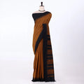 Kalyani Cotton saree with Brown body and black zari border, front drape view