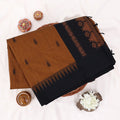 Kalyani Cotton saree with Brown body and black zari border, folded top view