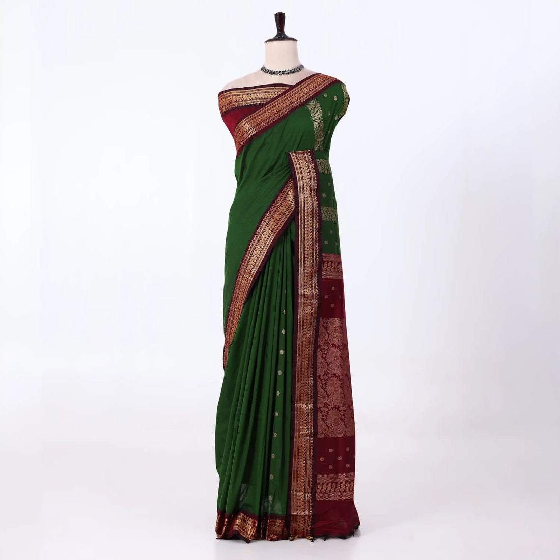 Kalyani Cotton saree with plain deep green body and maroon zari woven border, front drape view