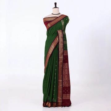 Kalyani Cotton saree with plain deep green body and maroon zari woven border, front drape view