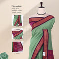 Kalyani Cotton saree with green checked body and black zari woven border, front drape close-up with design details.