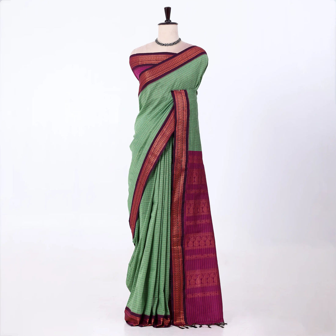 Kalyani Cotton saree with green  checked body and red zari woven border, front drape view