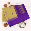 Kalyani Cotton saree with green body and violet zari border, folded top view