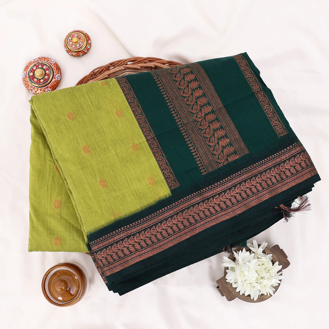 Kalyani Cotton saree with lime green body and dark green zari woven border, front drape view