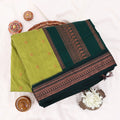 Kalyani Cotton saree with lime green body and dark green zari woven border, folded top view