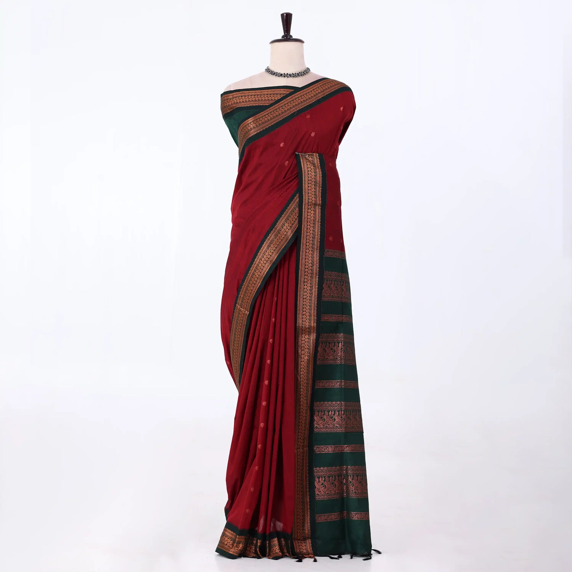 Kalyani Cotton saree with maroon body and dark green zari woven border, front drape view 