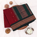 Kalyani Cotton saree with maroon body and dark green zari woven border,folded top view
