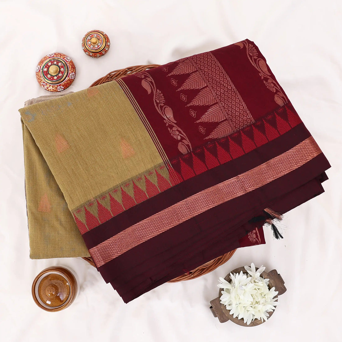 Kalyani Cotton saree with Olive green body and maroon zari border, front drape view