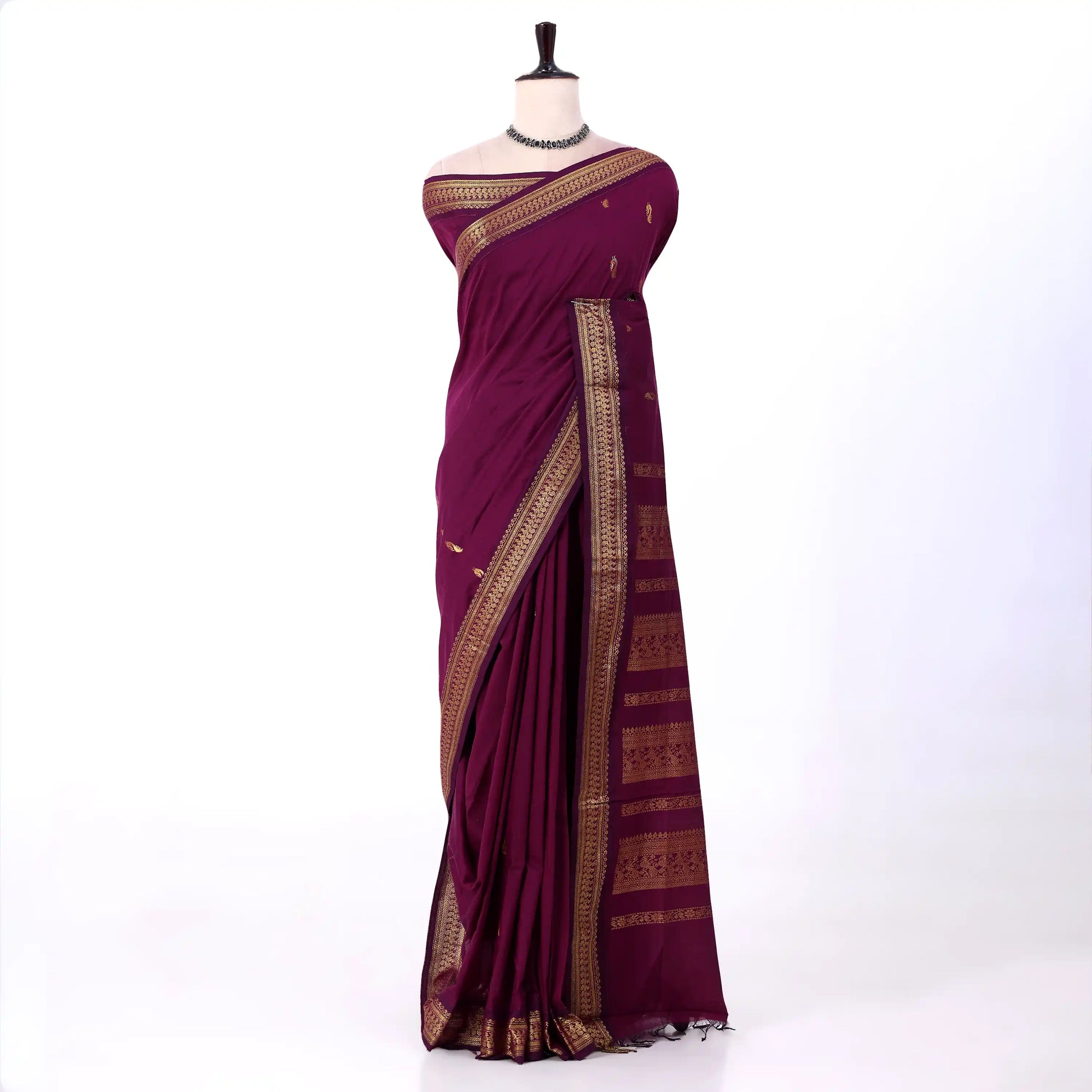 Kalyani Cotton saree with deep purple body and golden zari woven border, front drape view