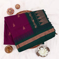 Kalyani Cotton saree with purple body and green zari border, folded top view
