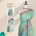 Kanchi Cotton Saree With Light Green Body And Purple Zari Motif Border Front Draped View On Mannequin 
