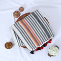Mul mul cotton saree featuring grey white stripes colorful center stripe and tassels top view