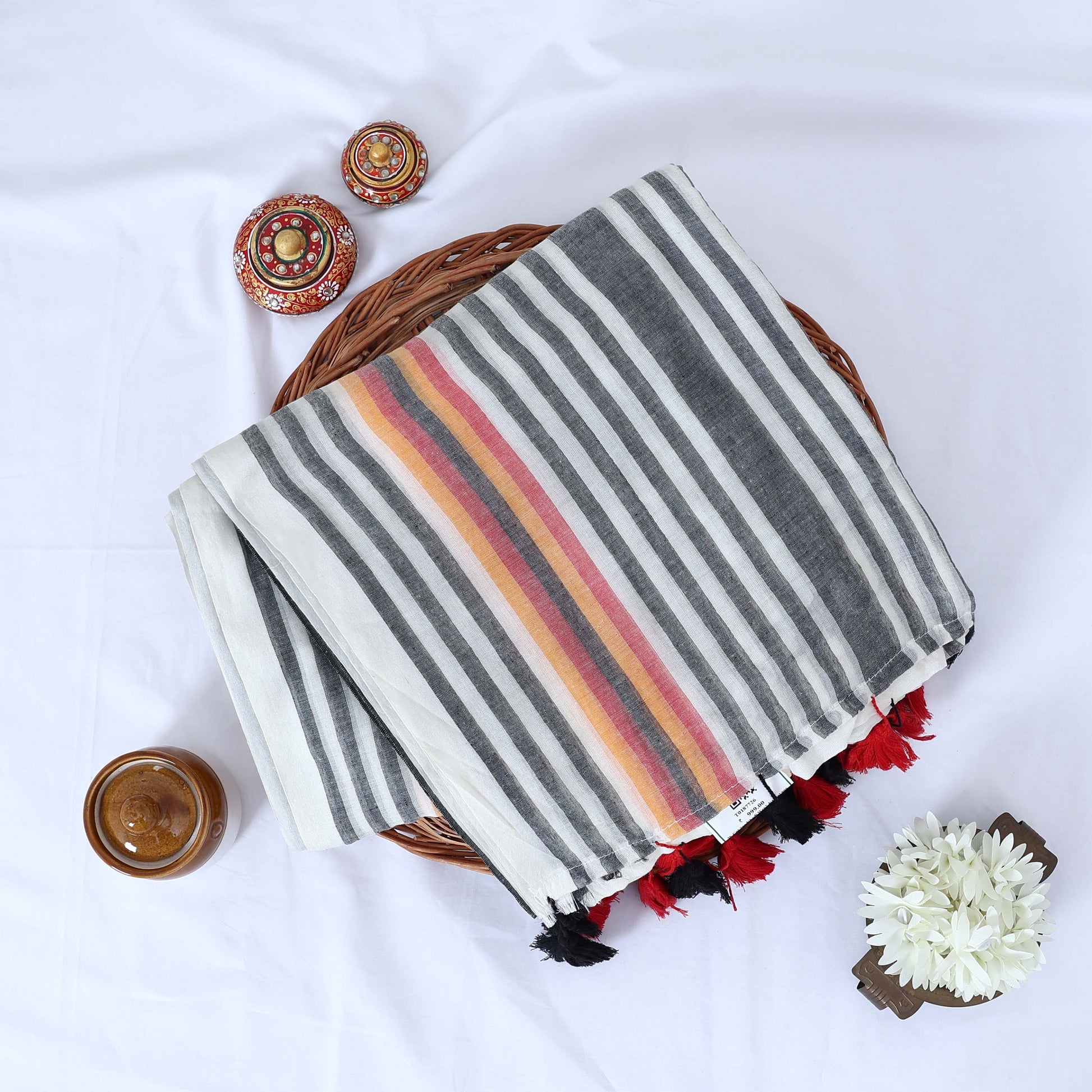 Mul mul cotton saree featuring grey white stripes colorful center stripe and tassels top view