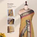 Olive Green Kanchi Cotton Saree A Green And Pink Zari Border Front View Displayed On A Mannequin
