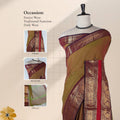 Kanchi Cotton Saree With Maroon Zari Border In Olive Green And Red Tones Front View On Mannequin
