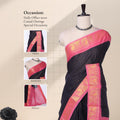 Navy Blue Sungudi cotton saree with gold zari checks and pink peacock motif border draped front view on mannequin