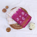Sungudi cotton saree with white tie-dye motifs purple and white design gold check pattern folded top view