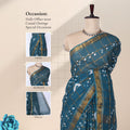 Sungudi cotton saree with gold checked weave and white Bandhani motifs in teal blue front drape view on mannequin
