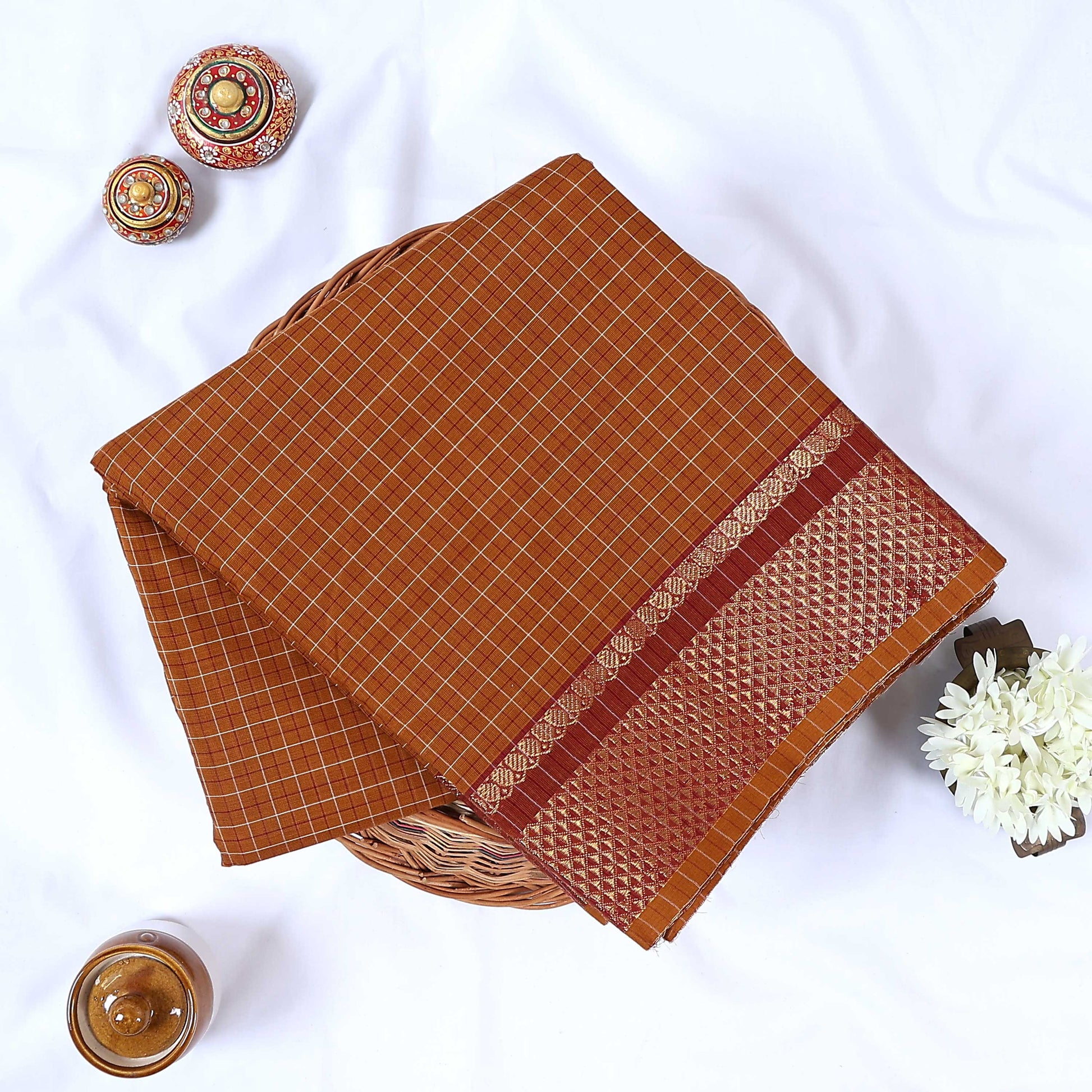 Venkatagiri cotton saree with brown checks and gold zari woven border folded front product view