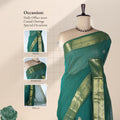 Venkatagiri cotton saree with dark green body peacock zari border and floral buttas front draped mannequin view.