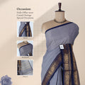 Venkatagiri cotton saree with elegant navy blue zari border in light grey front draped mannequin view.