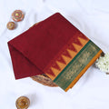 Venkatagiri cotton saree with broad floral zari border in maroon and green folded front view