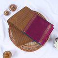 Venkatagiri cotton saree with gold zari checked body and contrast maroon zari border in olive neatly folded top view