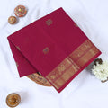 Venkatagiri cotton saree with elegant gold zari floral motifs and border in magenta pink front flat lay view