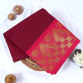 Venkatagiri cotton saree with maroon body pink geometric temple zari border folded top view with border details.