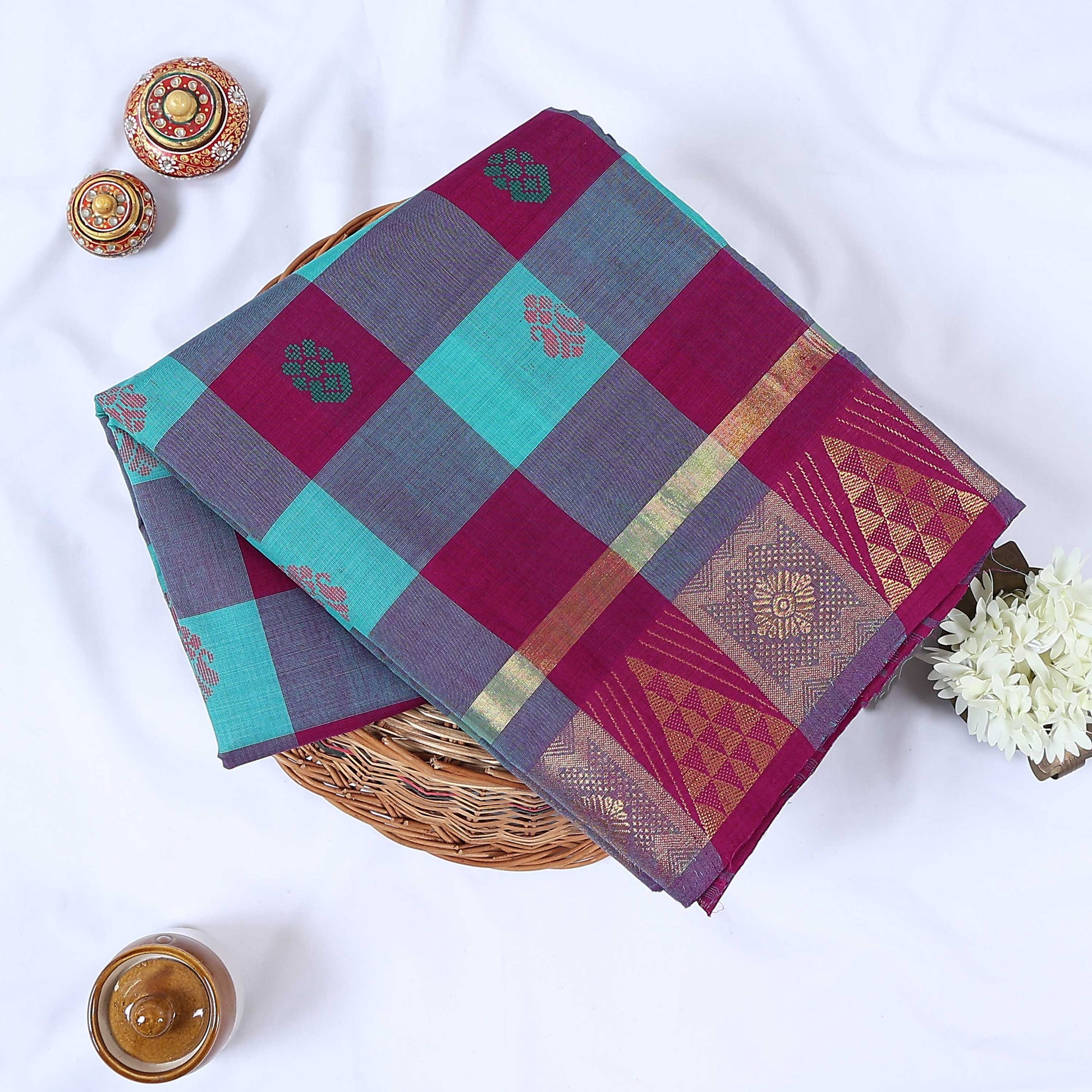 Venkatagiri cotton saree with multicolor checked pattern floral butta and zari woven border folded top view