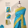 Blue voile cotton saree with floral butta woven pattern and contrast green zari border front draped view on mannequin