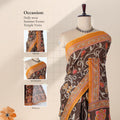 Brown voile cotton saree with paisley vine print body and floral border front draped view on mannequin.