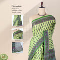 Voile cotton saree with floral motif print and contrast floral border in green front draped mannequin view.