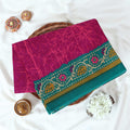 Purple Voile cotton saree with abstract crackle print body and floral contrast teal border folded top view