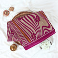 Voile cotton saree purple floral motifs and wavy beige stripe pattern with yellow accents top view.