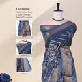 Front view of blue Dola saree with floral print woven contrast border and pallu styled on mannequin for display.