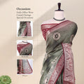 Green Dola silk saree with circular motifs and maroon woven border front view on mannequin with ornate pallu.
