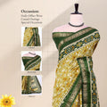 Green Dola silk saree with geometric ethnic print and floral woven border front view on mannequin with pallu.