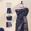 Front view of navy Dola saree with geometric Bandhani print, zari woven border and decorative pallu on mannequin.