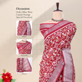 Maroon Dola silk saree with elephant floral motif print and contrast woven border front view on mannequin with pallu.