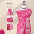 Front view of pink Dola saree with floral print zari woven border and decorative pallu displayed on mannequin.