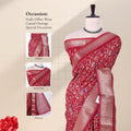 Front view of red Dola saree with floral vine print silver zari woven border and decorative pallu on mannequin.