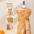 Front view of yellow Dola saree with checked floral print zari woven border and decorative pallu on mannequin.