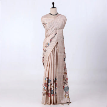 A beige and white striped saree with colorful floral prints