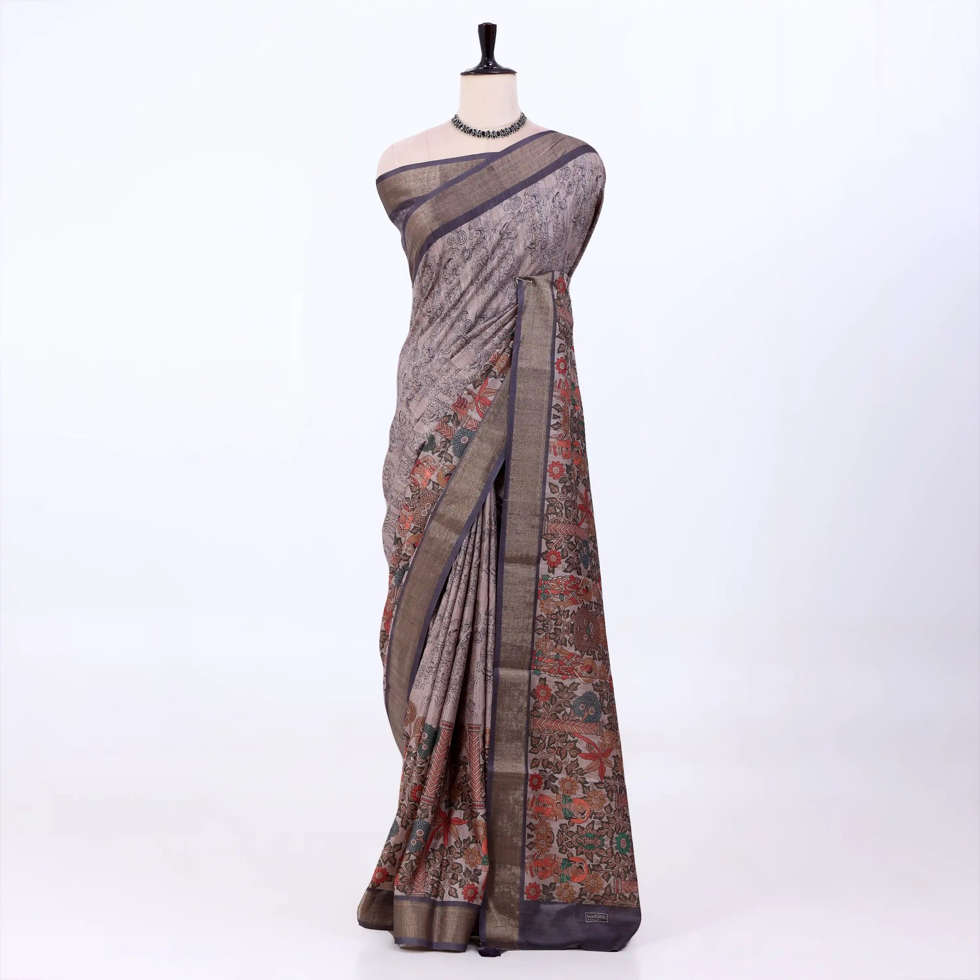 Brown Semi Tussar saree featuring floral print with navy woven border, elegant front drape view