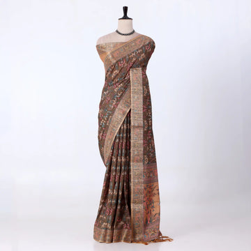 A draped saree with an intricate multicolor floral and geometric pattern