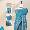 A teal blue saree with a floral print and silver checkered border with detail of head, blouse, and pallu
